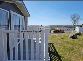 Prestigue 3bed, 8berth seaview holiday home with decking at Combehaven holiday park